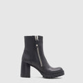 Emma ankle boot in black calf leather with an outside zipper