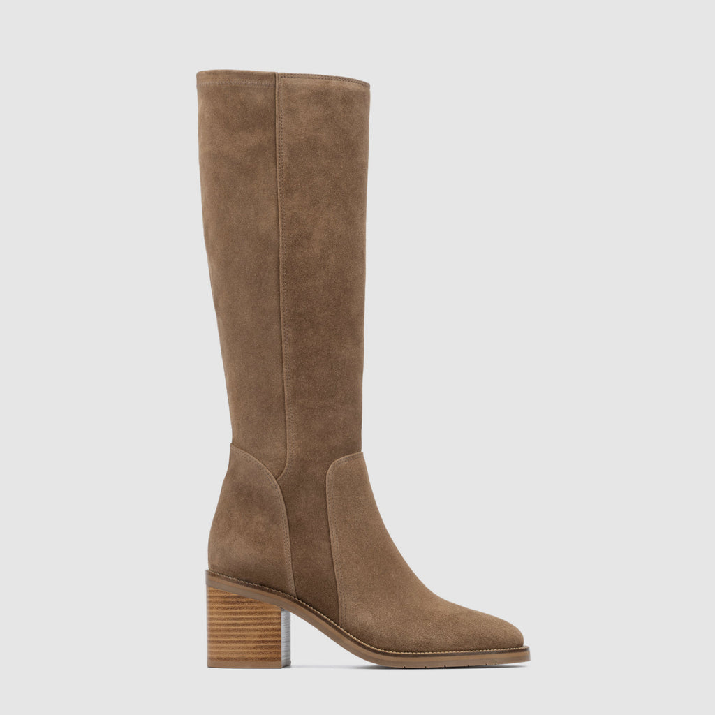 Jasmina knee high boot in champagne suede with a stacked heel