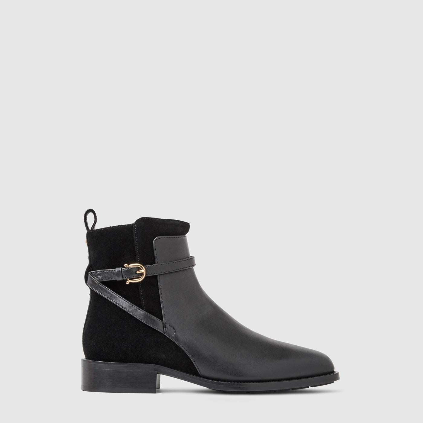 Nettie ankle boot in black leather with a criss-cross buckle